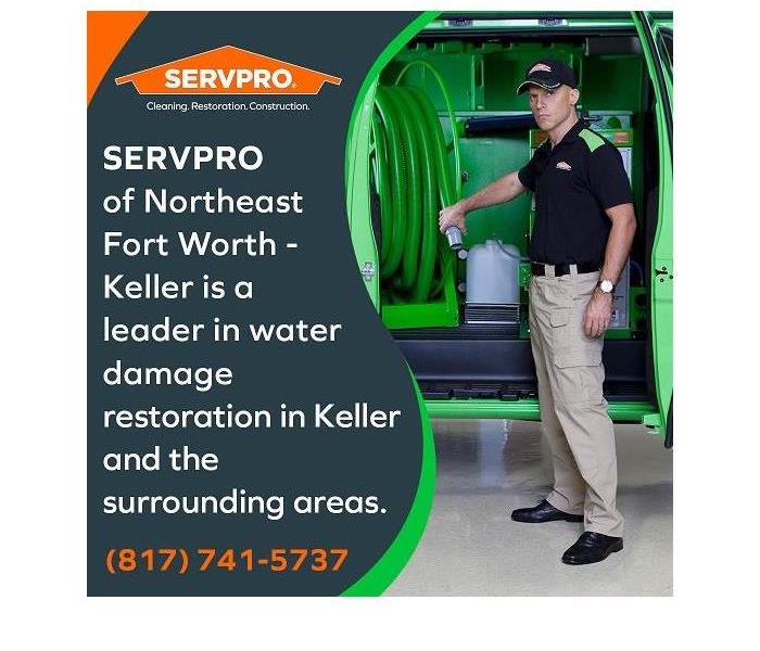 SERVPRO technician pulling out a hose reel from the SERVPRO truck